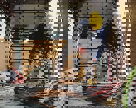 Electrician preparing cables and equipment 