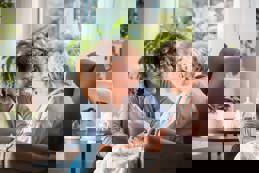 Nurse supporting eldery lady