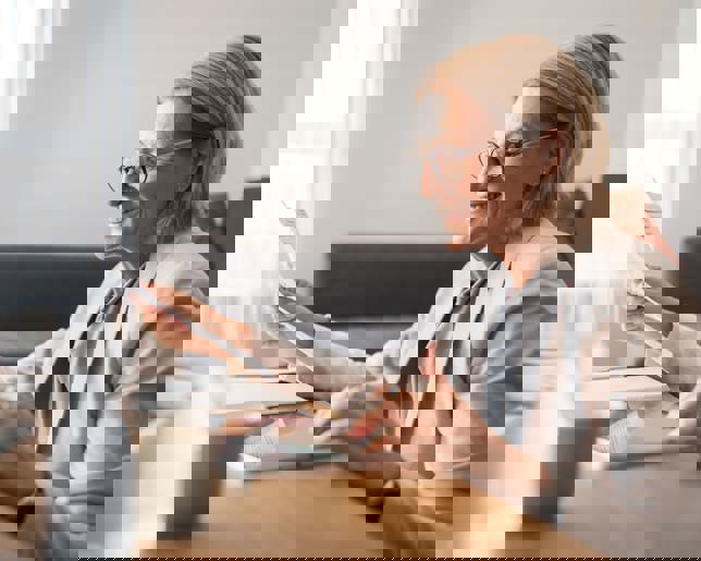 Businesswoman reviewing documents 