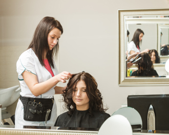 Getting hairstyle done at hairdresser