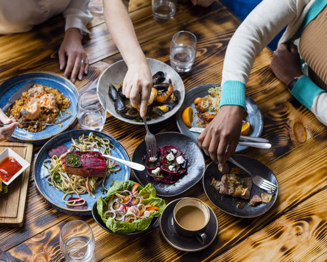 Friends dining in restaurant